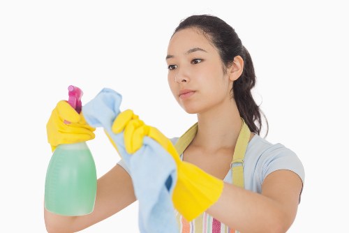Professional cleaner preparing a service agreement document