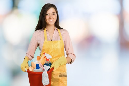 Cleaner using appropriate protective equipment